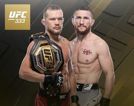 На изображении двое мужчин в спортивной форме на фоне с логотипом UFC 333. Один из них держит чемпионский пояс UFC. Оба находятся в стойке, характерной для единоборств